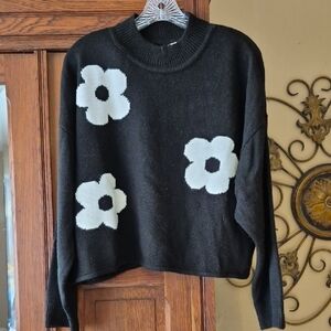 Divided Black Sweater with White Floral Design
